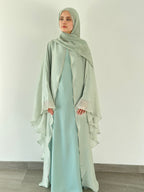 Nujūm Al Thawb Reversible Embroidered Abaya