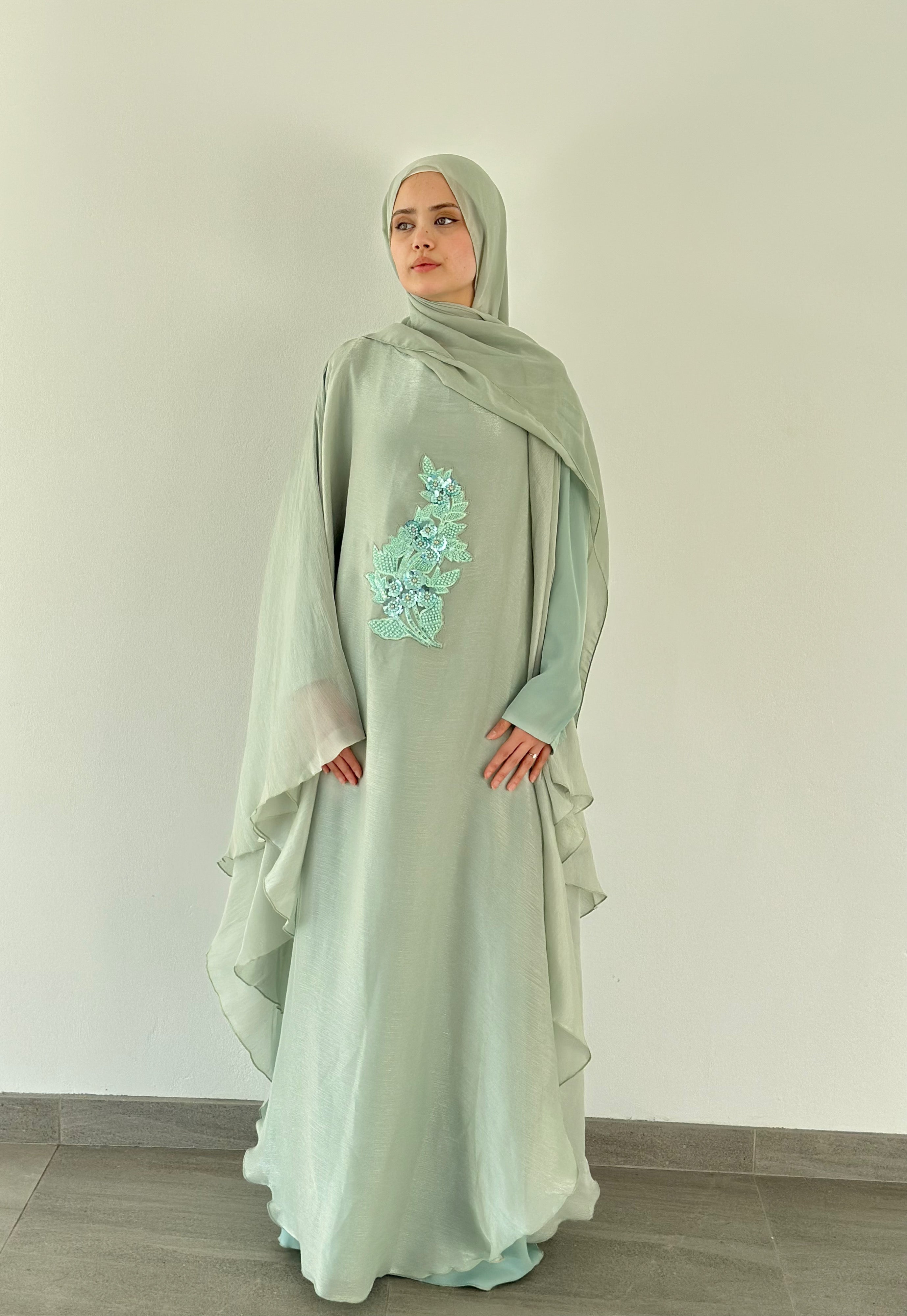 Nujūm Al Thawb Reversible Embroidered Abaya