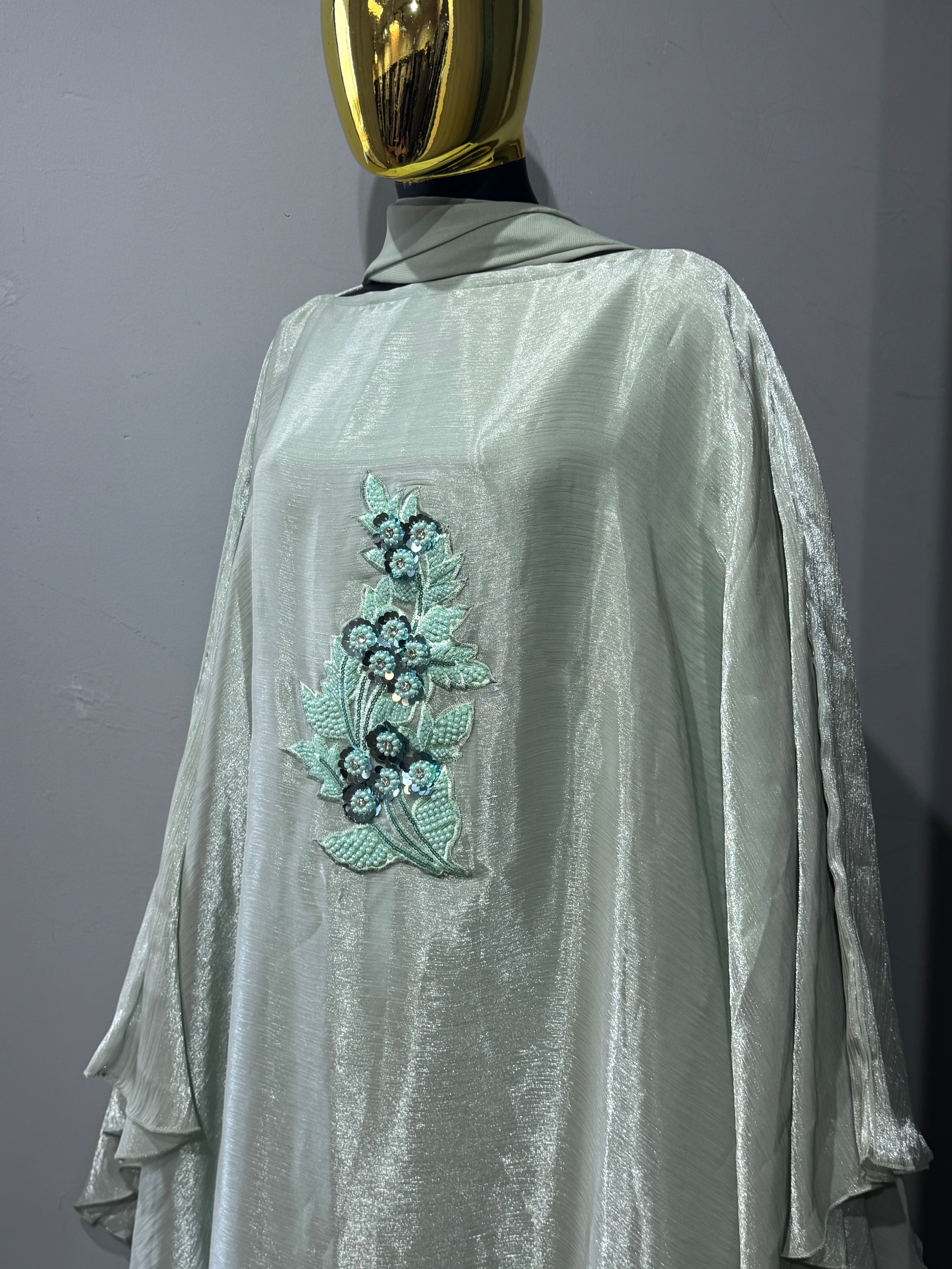 Nujūm Al Thawb Reversible Embroidered Abaya