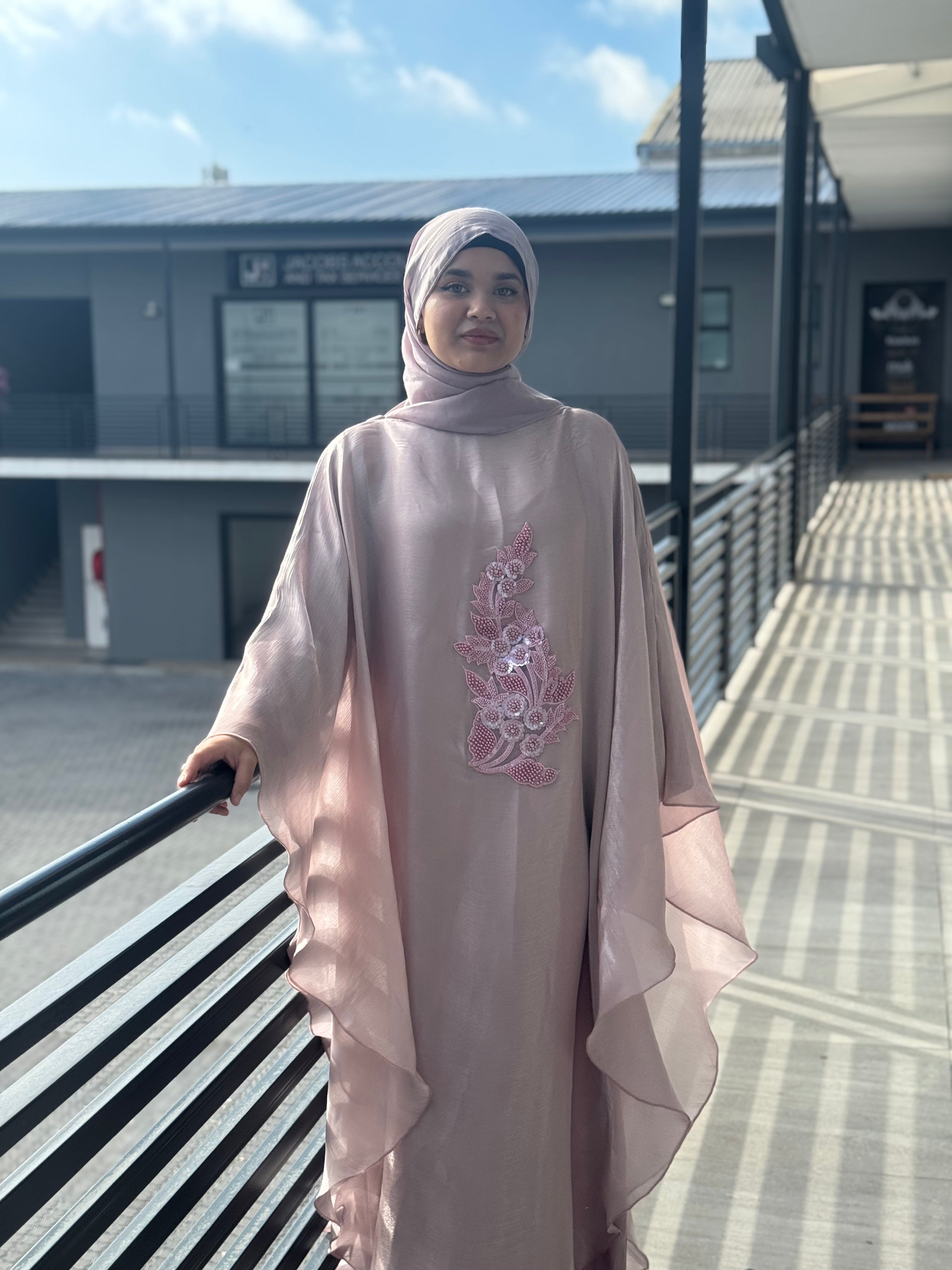 Nujūm Al Thawb Reversible Embroidered Abaya