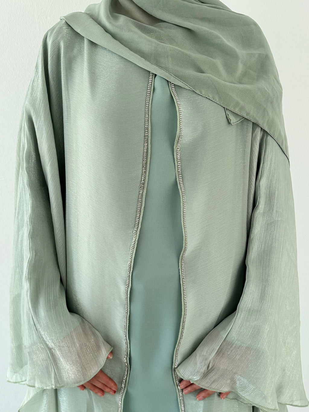 Nujūm Al Thawb Reversible Embroidered Abaya