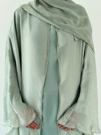 Nujūm Al Thawb Reversible Embroidered Abaya