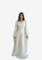 The "Ethereal Radiance" Crystal Pleated Gown