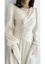 The "Ethereal Radiance" Crystal Pleated Gown